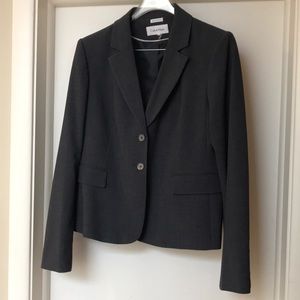 Charcoal grey suit jacket and matching skirt